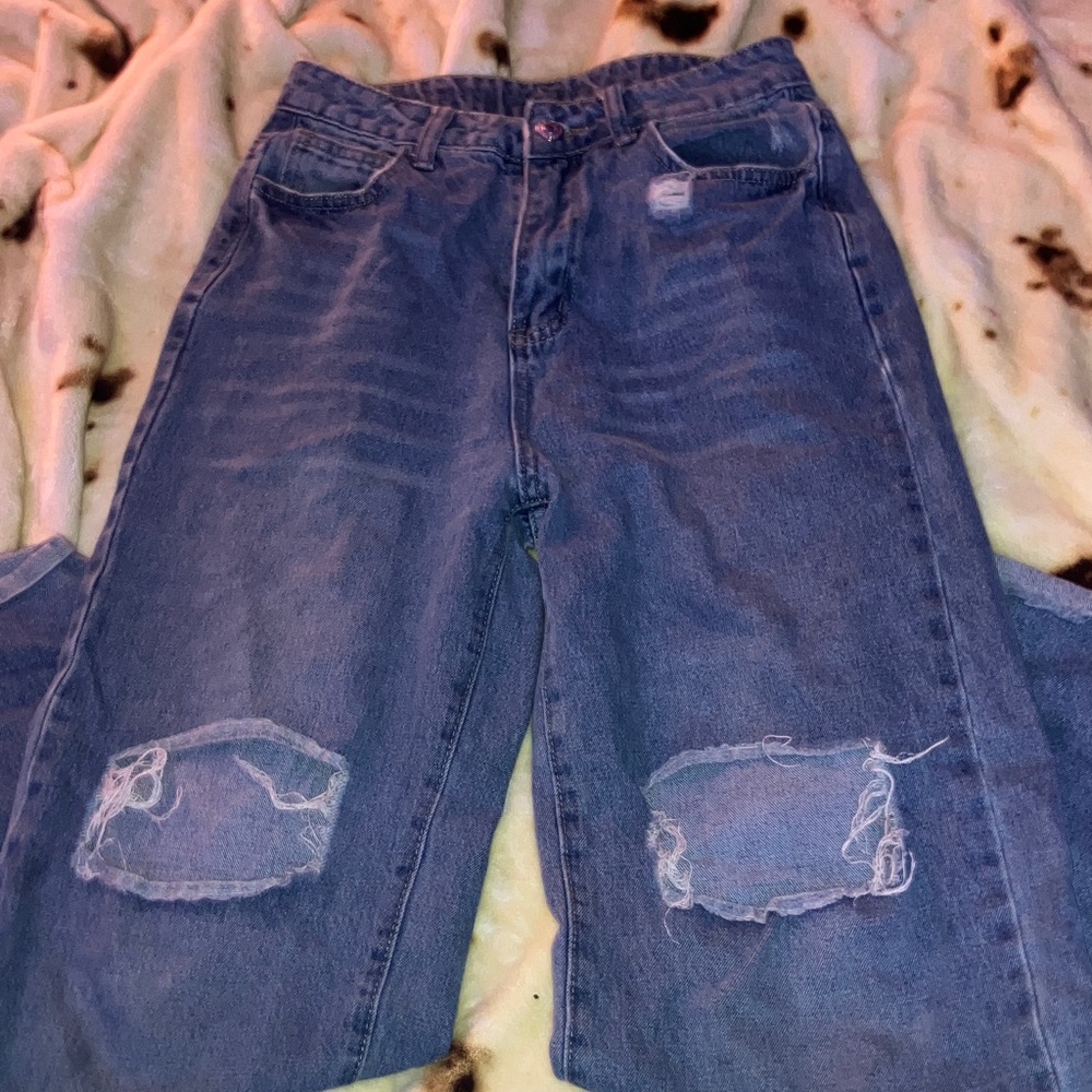 high waisted blue ripped jeans